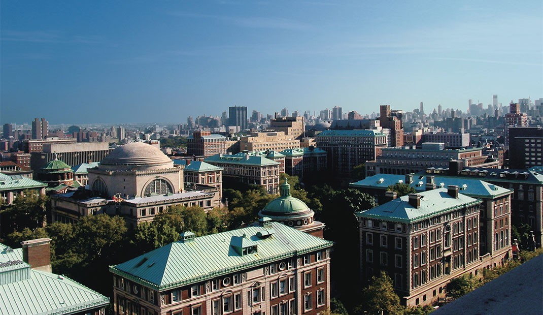 Arial view of the Morningside campus with a clear blue sky in the background.