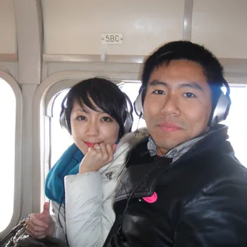 Male and female couple on an airplane