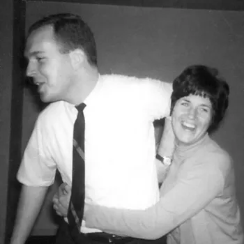 Black and white photograph of a male and female couple.