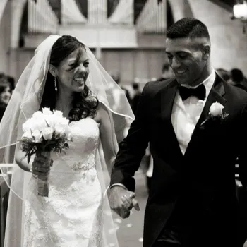 Bride and groom in a black and white photo. 