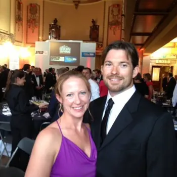 Male and female couple at an indoor reception