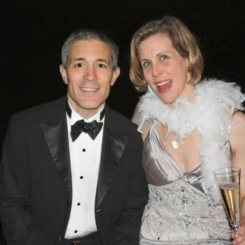 Male and female couple in evening dress.