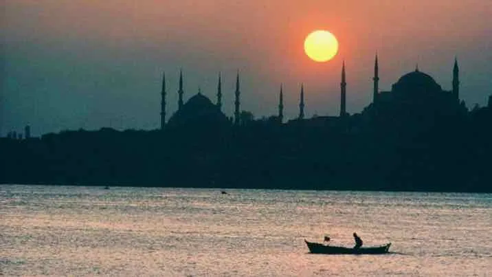 Silhouette of a mosque at sunset