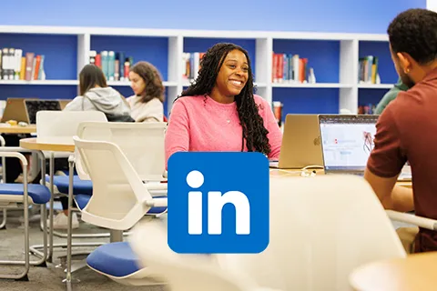Students collaborating with laptops in a study space, with a LinkedIn logo overlay.