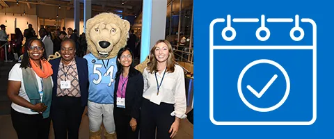 Image of people with Roar-ee at an event.