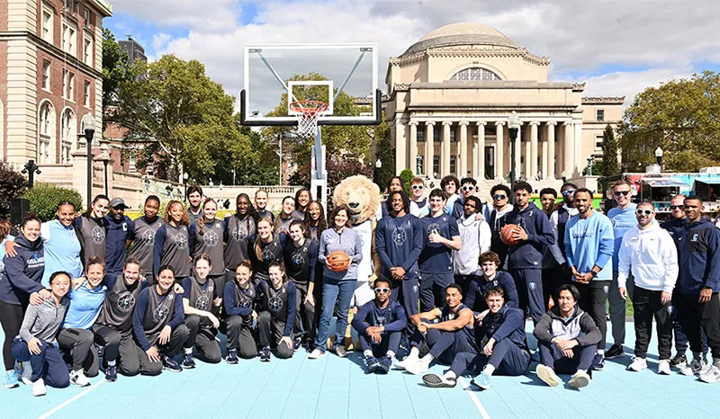 Acting President Claire Shipman’86CC, ’94SIPA  with the men's and women's basketball teams.