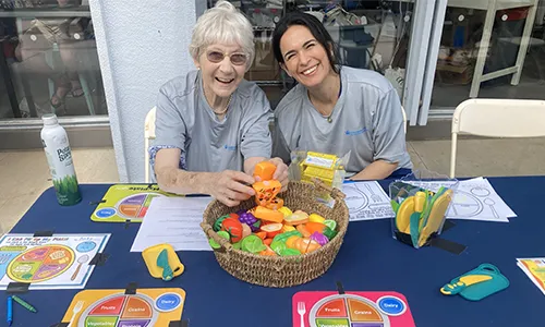 Nursing volunteers at nutrition station