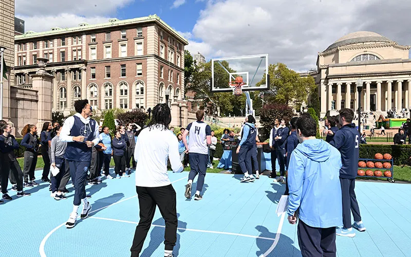 Basketball team playing on South Lawn